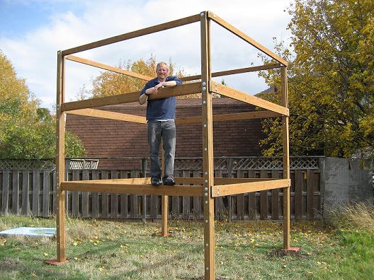 Me standing on the frame of the fort ... prior to pouring the concrete footers!